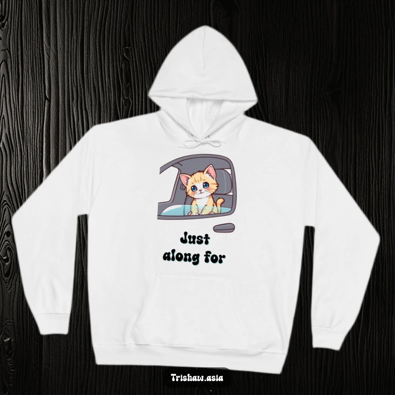 Funny Hoodie showcasing a playful kitten sitting in a passenger seat, looking around curiously, radiating warmth and humor.