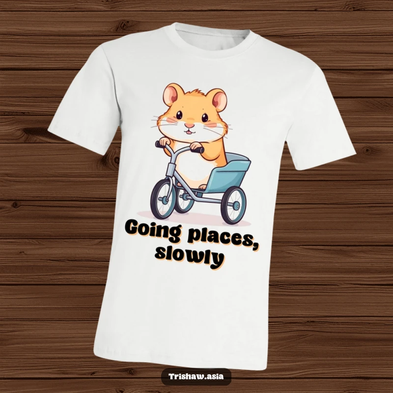 Funny t-shirt depicting a small, determined hamster gripping the handlebars of a trishaw, symbolizing ambition and hilarity.