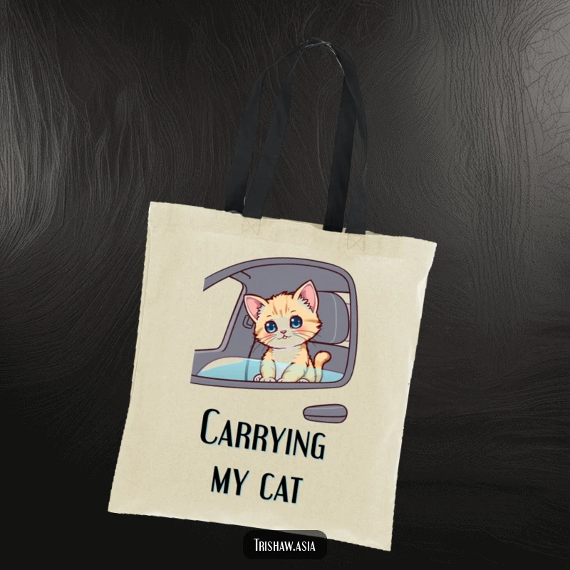 Funny Tote Bag featuring a playful kitten sitting in a passenger seat, looking around curiously, perfect for carrying essentials.